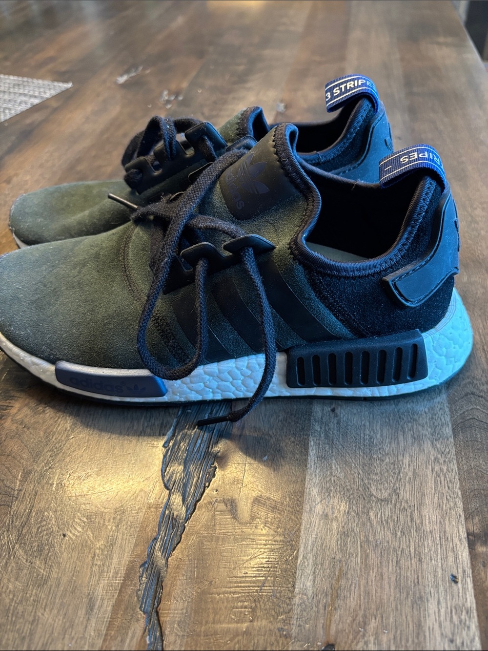 adidas woman’s NMD R1 Sneakers in Black and Olive Green suede like material